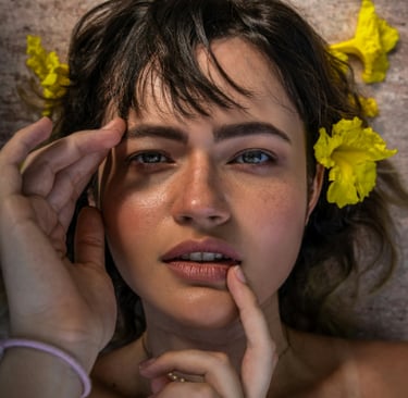 Close-up of a person with healthy, glowing skin, natural dewy texture, and a calm expression