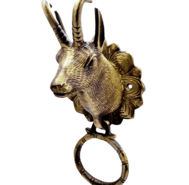 a goat head with a ring on it's ring