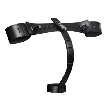 a leather bondage device the locks the wrist to the cock