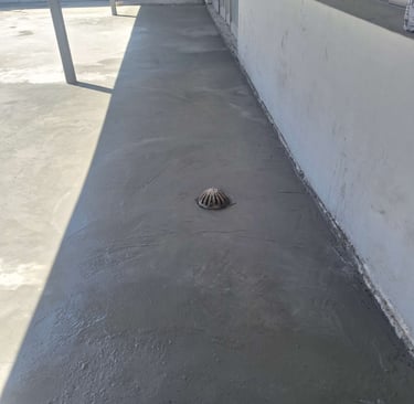 Specialized waterproofing screeded to a fall towards drainage system, Harbor Bay Mall, Cape Town, False Bay