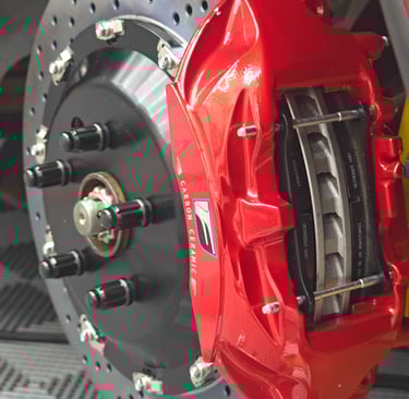 RCF Track Edition rear calipers retrofitted to a MKIV Supra using 380mm rotors
