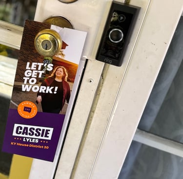 a door handle latched door with a sign that says let's get off