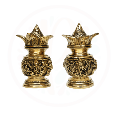 a pair of brass - plated candlesticks