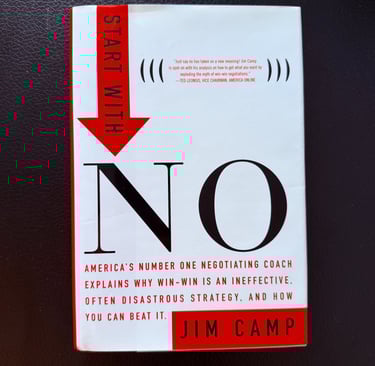 a book cover of a book with a red arrow pointing up