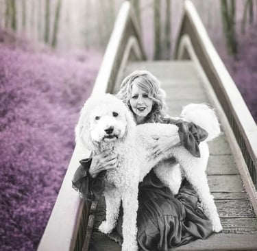 melissa joy with her dog lani on a bridge