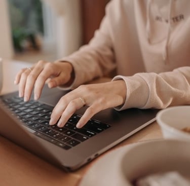 Bookkeeper using laptop