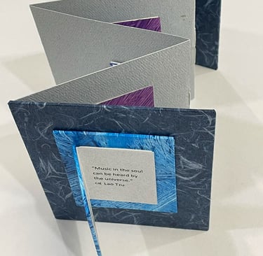 Accordion with Japanese paper and small book on cover - Bound Impressions