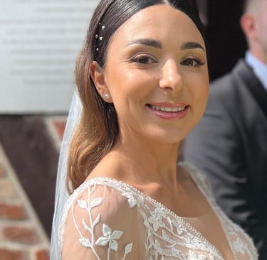 a woman in a wedding dress and a man in a suit