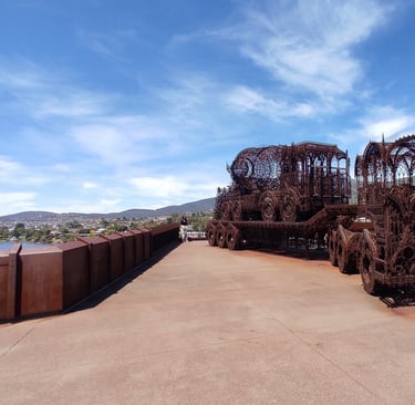 metal fram carriage scuplture in Hobart in the museum MONA