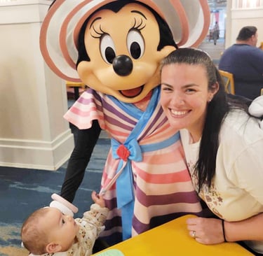 Sarah Rengulbai pictured with Minnie Mouse at Walt Disney World® Resort.
