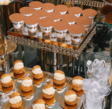 a table with a variety of desserts and desserts