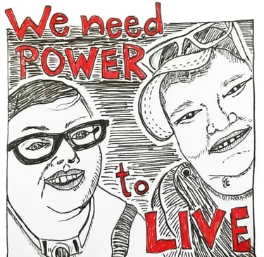Photo of Artists hand drawn poster of Stacey and a friend with words "We need Power to Live".