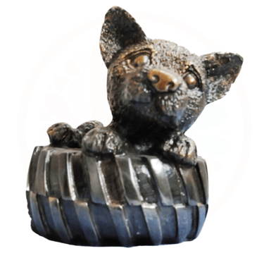 Brass Puppy seated in tyre Statue