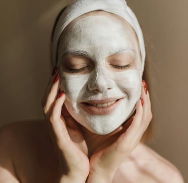 a woman with a white face mask on her face