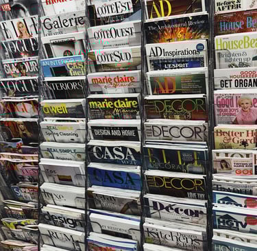 Magazines on a rack. Written word careers in brief