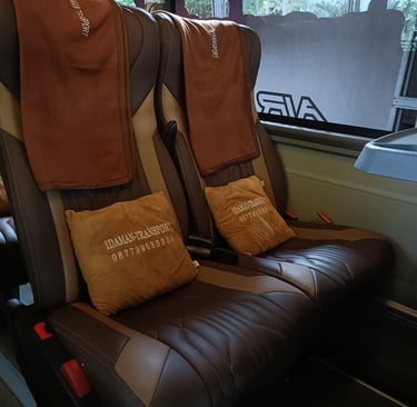 sewa bus pariwisata jogja fasilitas bantal & selimut