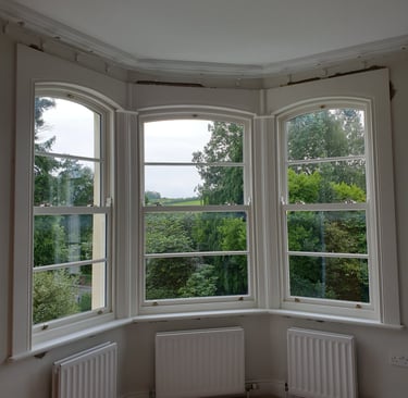 Traditional triple bay window replacement in Belfast