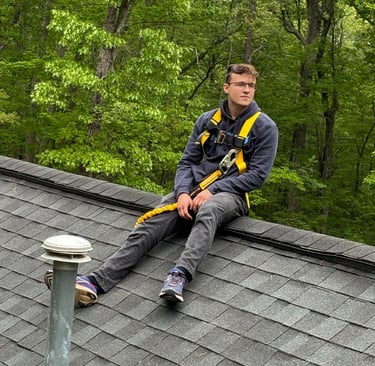 keegan mcgrath sitting on roof