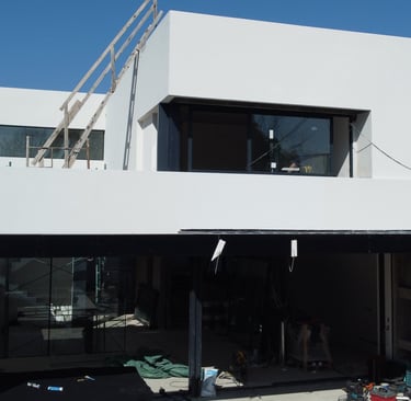 a house with a white house with a white roof