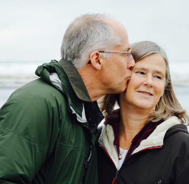 Empty nesters with mixed feelings about their children moving forward into adulthood