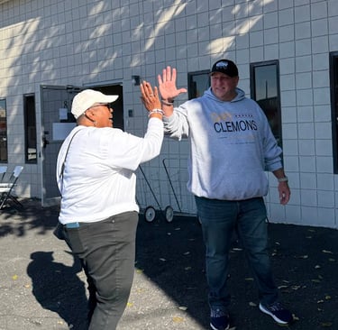 a man and woman are playing frisbee golf