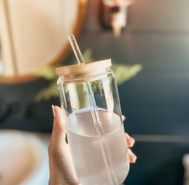 Electrolyte drink in reusable bottle on summer day