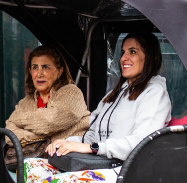mother and daughter from oman on bike taxi