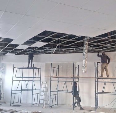 Commercial ceiling renovation – Belair Mall tenant improvements with ducting and grid ceiling