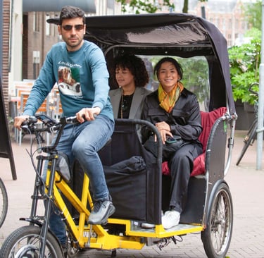 young latino ladies on bike taxi ride