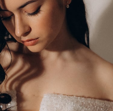 a woman in a white dress with a white dress