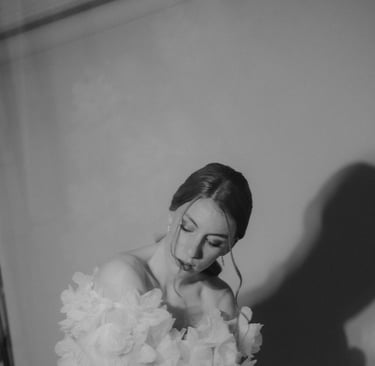 a woman in a white dress and a veil