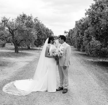 a bride and groom kissing at The Grove Redlands