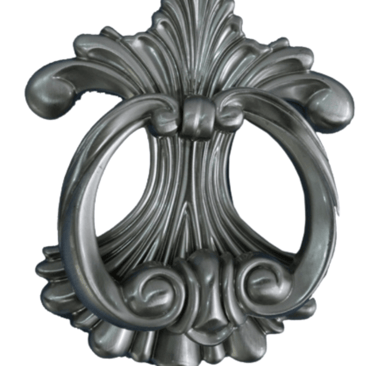 a metal door handle with a decorative design