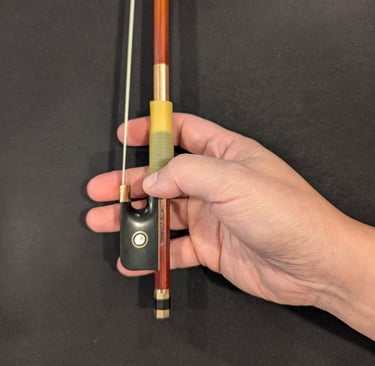 Curled thumb on the stick