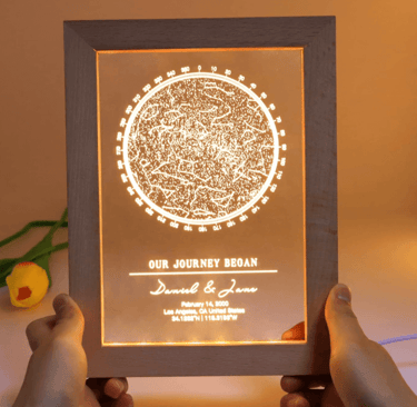 a person holding a personalised engraved star wars light box