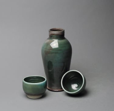 Sake bottle with two cups