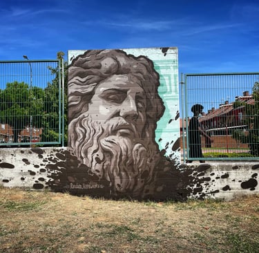 Mural de zeus en un evento de graffiti.