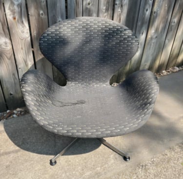 swan chair before with faded and damaged fabric