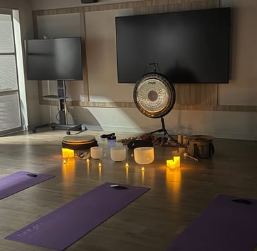 a corporate sound bath set up in an office gym