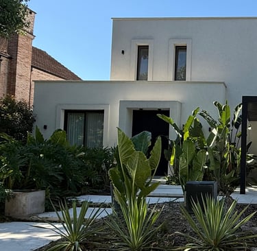 a house with a car parked in front of it