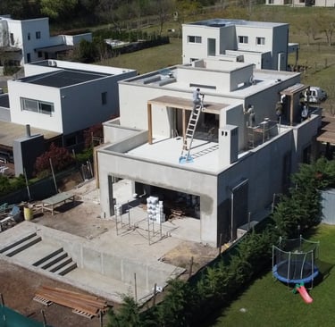 a house with a pool and a pool in the foreground