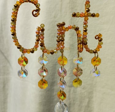 A gold sunshine inspired catcher. I was thinking of somewhere like ancient Greece