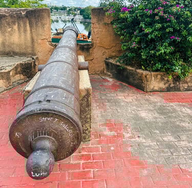 a cannon on a brick wall in a brick wall santo domingo punta cana