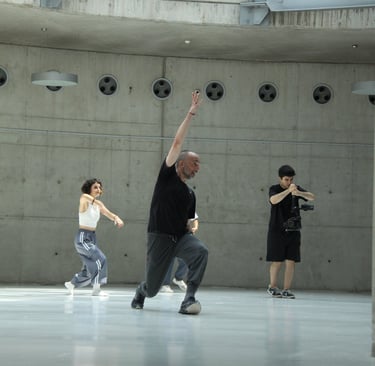 people exercising in a modern, concrete studio