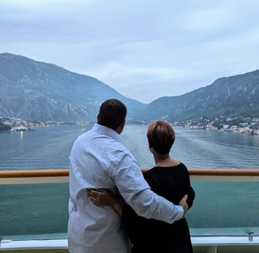 My wife and I on the back of a boat in the bay of Kotar, Montenegro