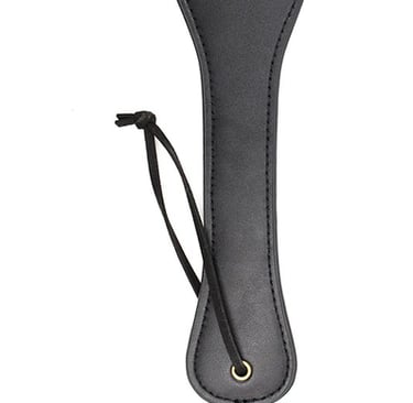 a faux leather paddle for bdsm play