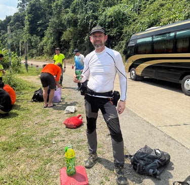 Nick Billington enjoying a cold beer after completing the Hang Son Doong Cave expedition in Vietnam