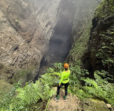 looking at the entrance to the cave in doline 1, Hang Son Doong Cave, Vietnam