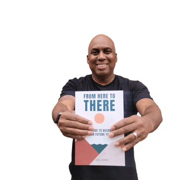 Lee Jones holding a book about how to write a book