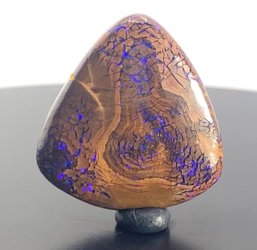 Purple flashes amongst Ironstone. Unique Queensland Boulder Opal from Australia.